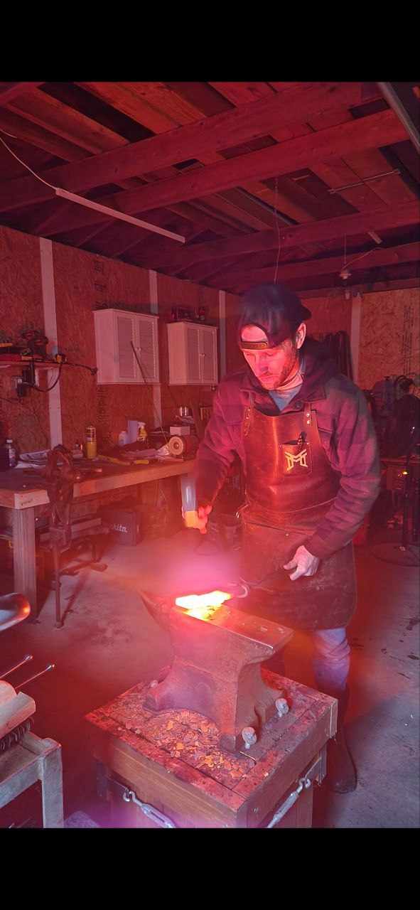 Kyle Tatsak at the forge
